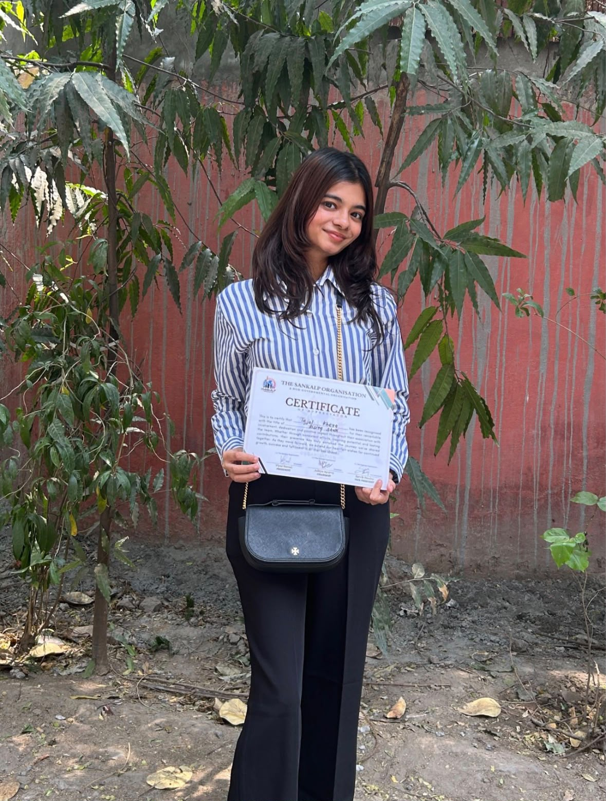 Tejal with Sankalp Organisation certificate